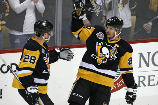 Rust scores first NHL hat trick in Penguins’ 8-5 win