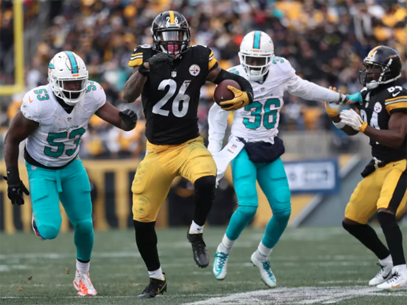 Behind Bell’s record performance, Steelers roll over Dolphins